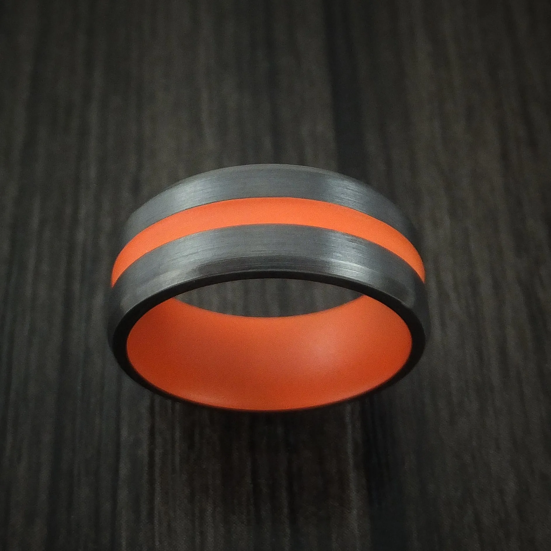 Black Titanium Men's Ring with Hunter Orange Cerakote Groove and Sleeve Custom Made Band